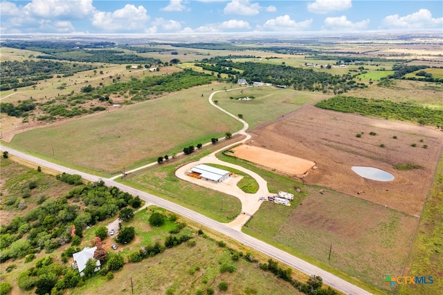 birds eye view of property featuring a rural view