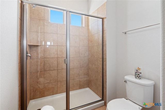 2105 Town Centre Dr Unit 42, Round Rock, TX 78664 - bathroom featuring toilet and a shower stall