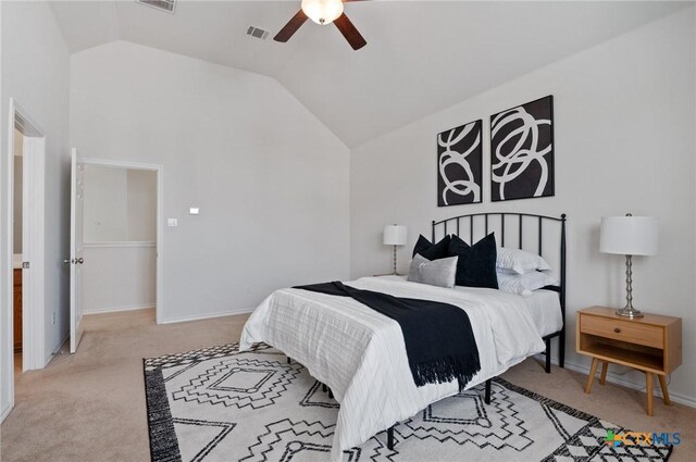 2105 Town Centre Dr Unit 42, Round Rock, TX 78664 - bedroom with light colored carpet, vaulted ceiling, and ceiling fan