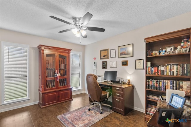 106 Westbrook Dr, Victoria, TX 77904 - office space featuring a ceiling fan, dark wood-type flooring, and a textured ceiling