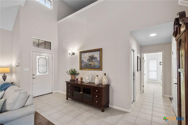 106 Westbrook Dr, Victoria, TX 77904 - entrance foyer with light tile patterned floors and a high ceiling