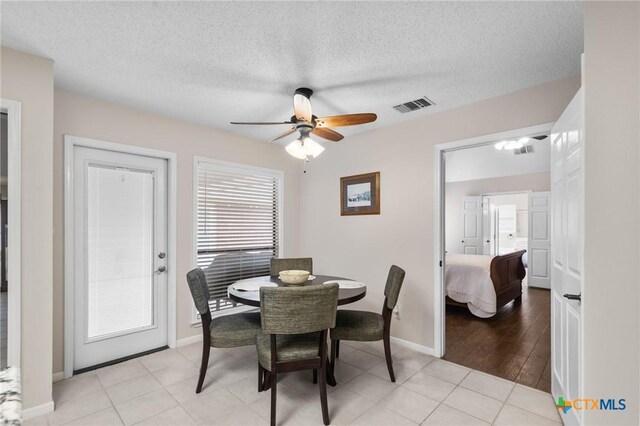 106 Westbrook Dr, Victoria, TX 77904 - dining space with a ceiling fan and a textured ceiling