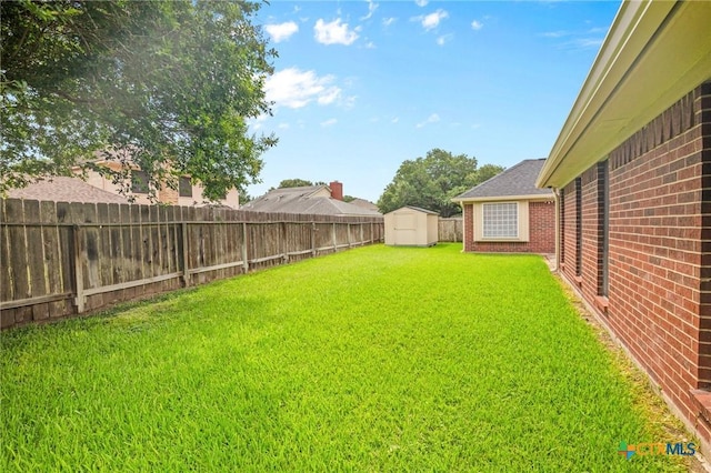 106 Westbrook Dr, Victoria, TX 77904 - fenced backyard with a storage shed