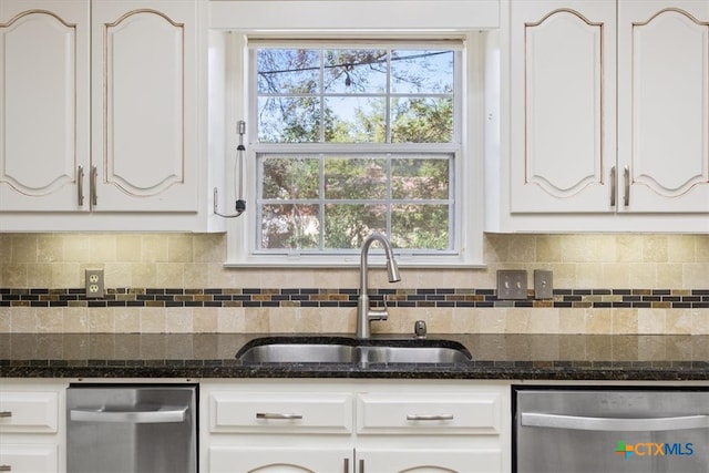 kitchen with white cabinetry, dishwasher, and sink