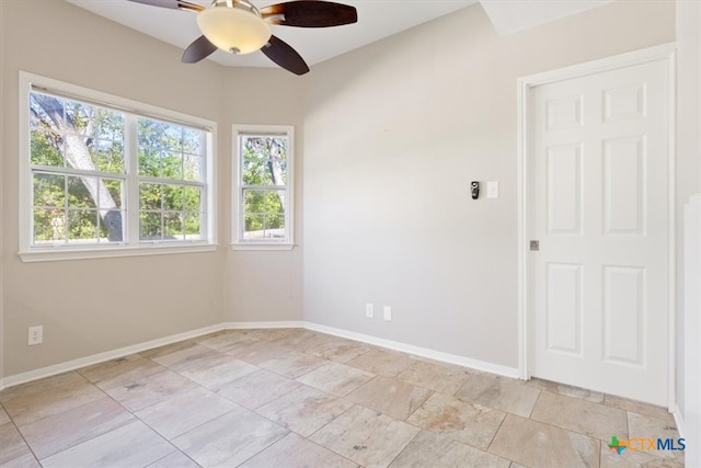 unfurnished room featuring ceiling fan