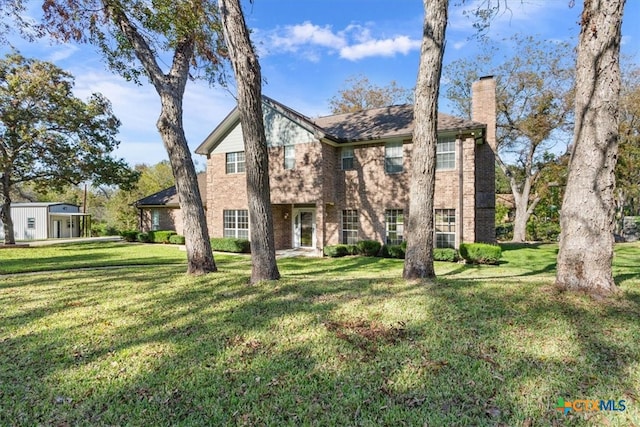 view of front of home with a front lawn