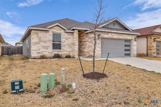 single story home with a garage, driveway, stone siding, and fence