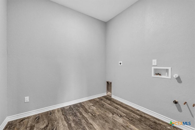 washroom with laundry area, gas dryer hookup, dark wood-type flooring, hookup for a washing machine, and electric dryer hookup