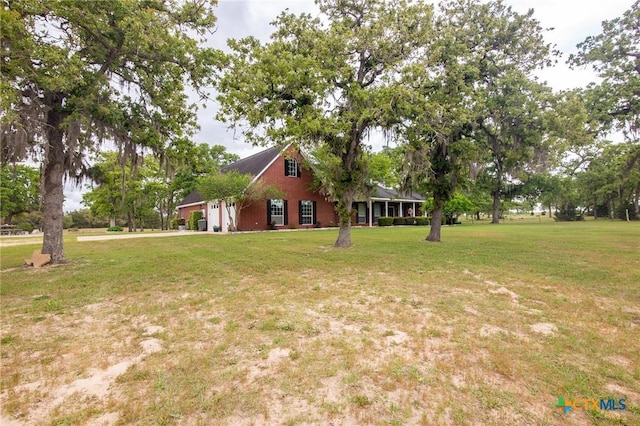 view of yard with an attached garage