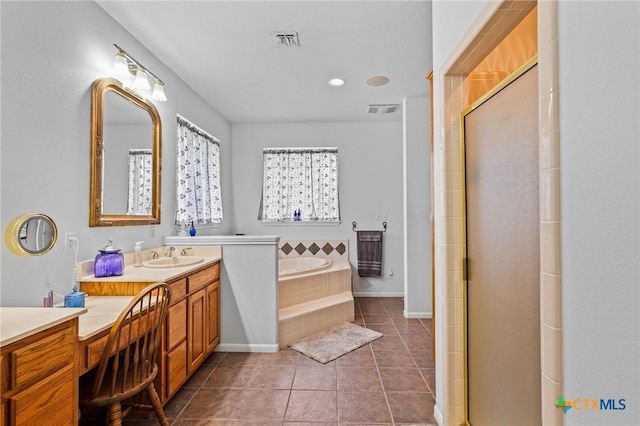 full bathroom with a shower stall, a bath, tile patterned flooring, and visible vents