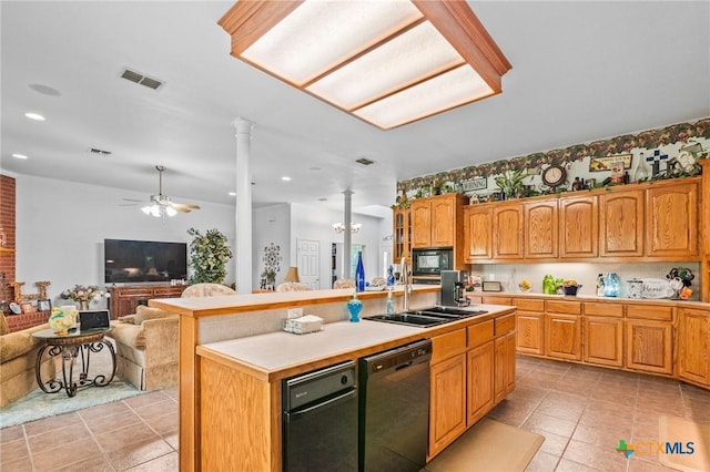 kitchen featuring black appliances, light tile patterned floors, visible vents, and ornate columns