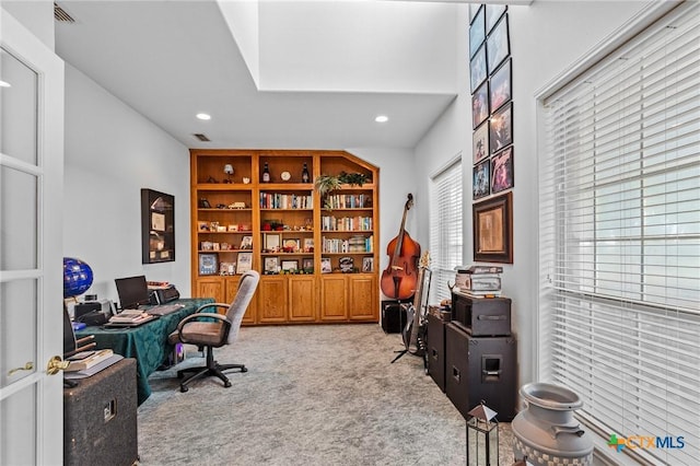 carpeted home office with visible vents and recessed lighting