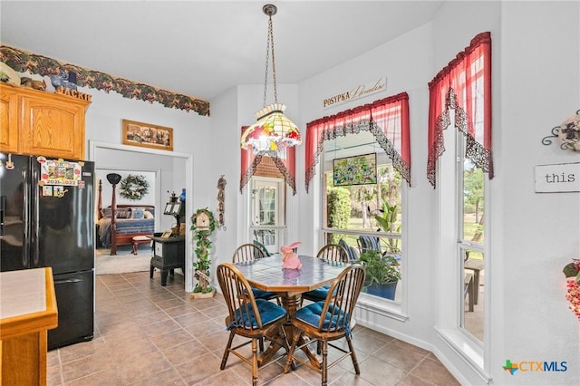 dining room featuring light tile patterned floors