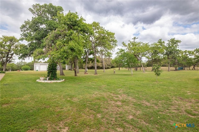 view of yard with a garage