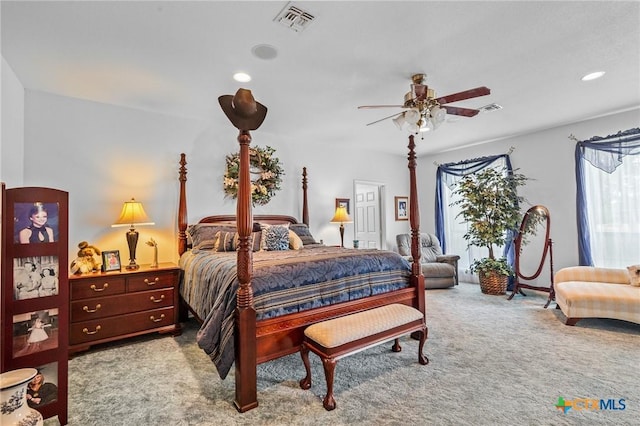 bedroom with carpet flooring, multiple windows, and visible vents
