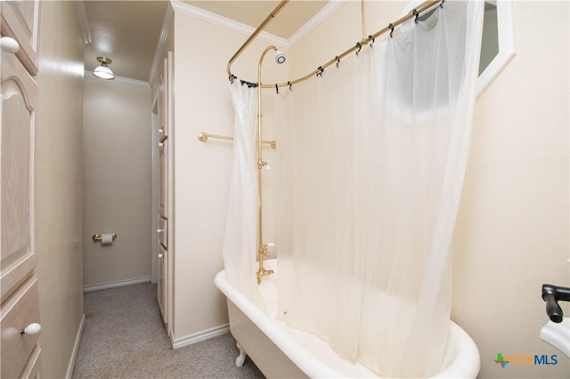 full bathroom featuring shower / tub combo, baseboards, and crown molding