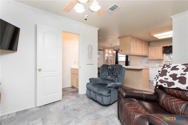 living room featuring baseboards, visible vents, a ceiling fan, and ornamental molding