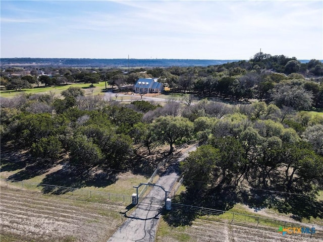 birds eye view of property featuring a rural view