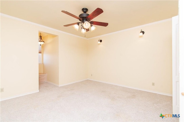 unfurnished room with light carpet, ornamental molding, and baseboards