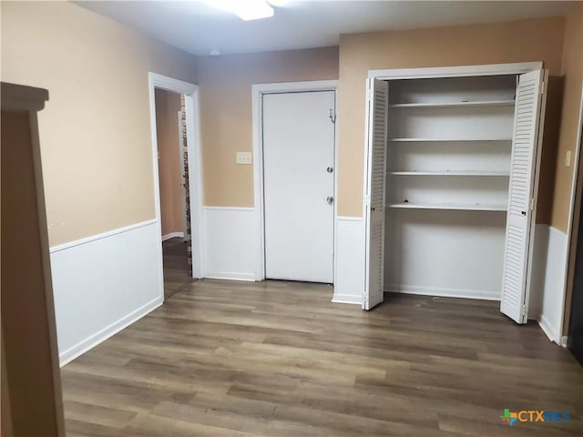 interior space with dark hardwood / wood-style floors