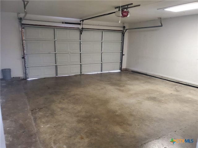 garage featuring a garage door opener