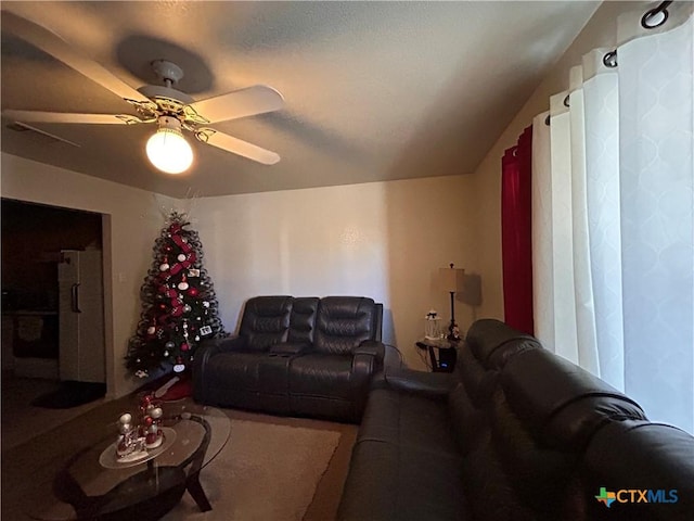 living room with ceiling fan