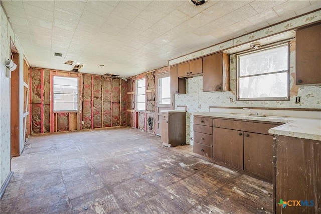 kitchen featuring light countertops