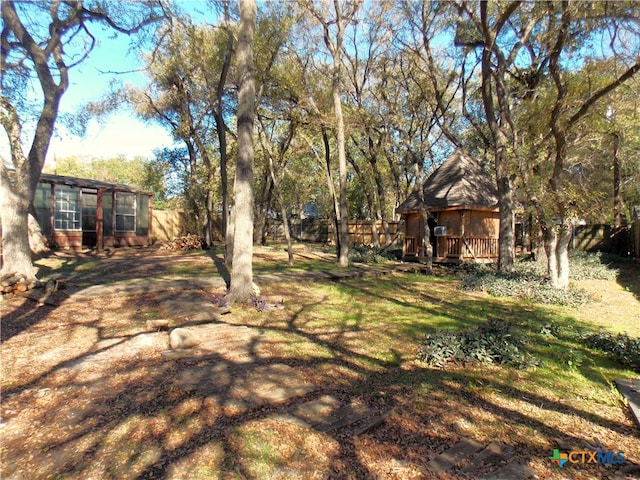 view of yard with a wooden deck