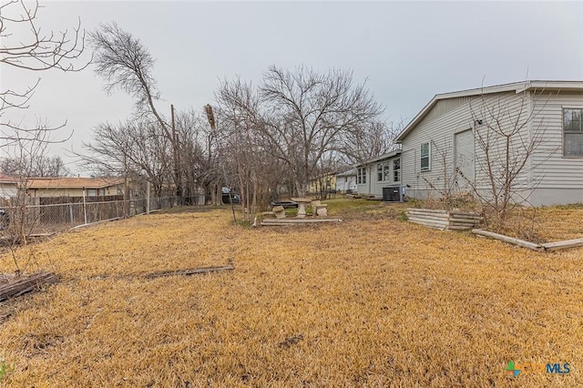 view of yard featuring central AC unit