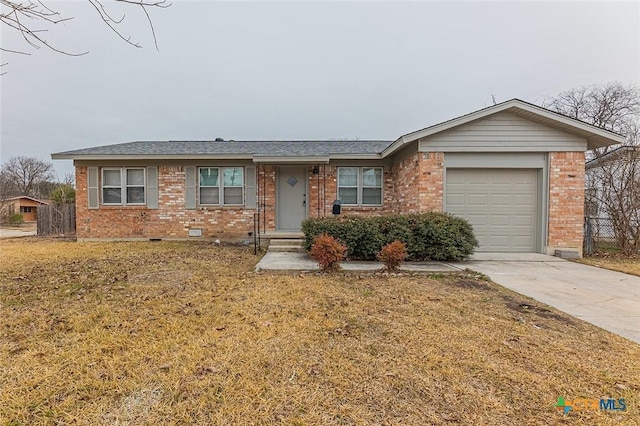 single story home with a garage and a front lawn