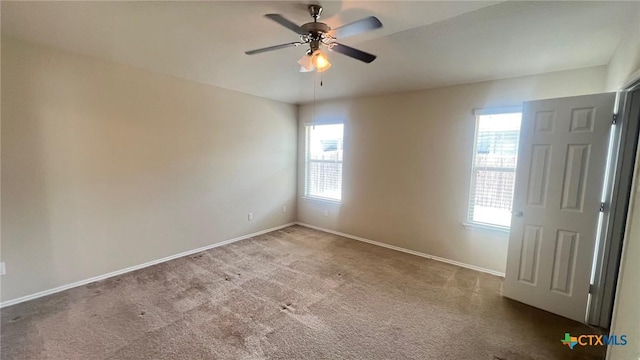 5711 Stonehaven Dr, Temple, TX 76502 - spare room featuring carpet flooring and a ceiling fan