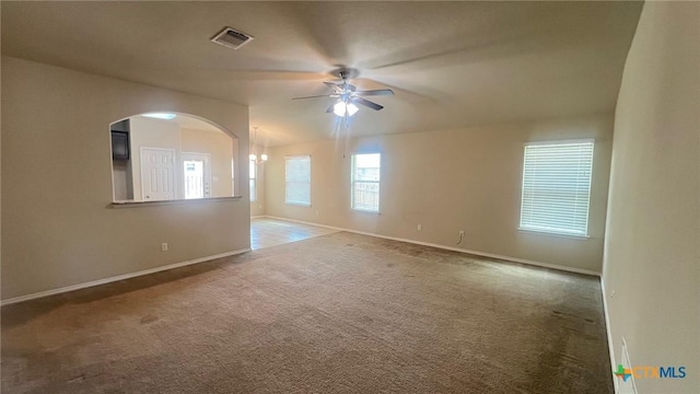 5711 Stonehaven Dr, Temple, TX 76502 - unfurnished room with a ceiling fan, carpet flooring, and arched walkways