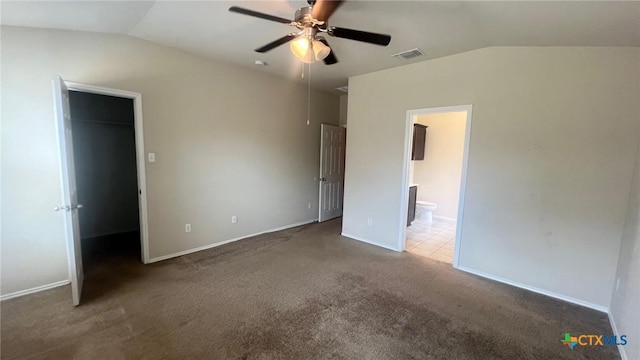 5711 Stonehaven Dr, Temple, TX 76502 - unfurnished bedroom with lofted ceiling, a spacious closet, carpet floors, ensuite bath, and ceiling fan