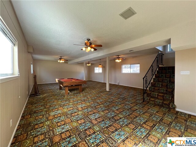 recreation room featuring ceiling fan, a textured ceiling, and billiards