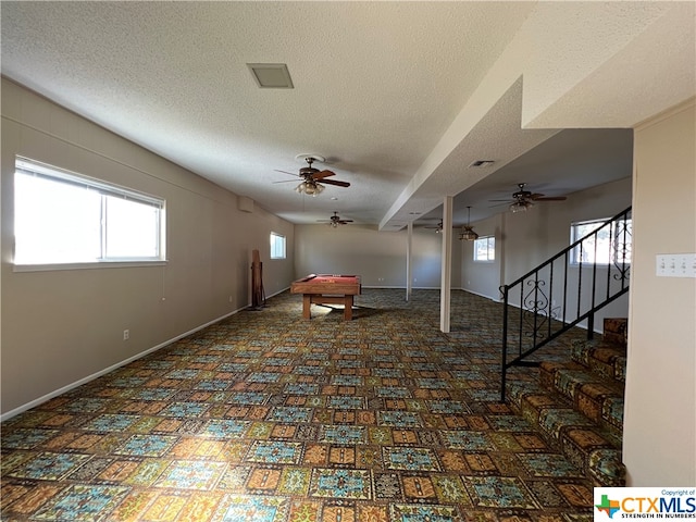 interior space with a textured ceiling