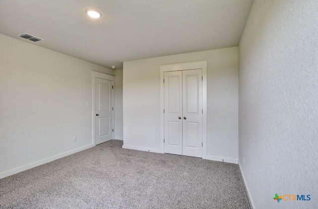 3625 Meteor Rd, New Braunfels, TX 78130 - unfurnished bedroom with baseboards, carpet floors, and a closet