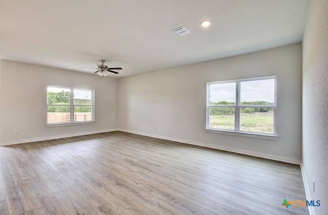 3625 Meteor Rd, New Braunfels, TX 78130 - empty room with ceiling fan, wood finished floors, and baseboards