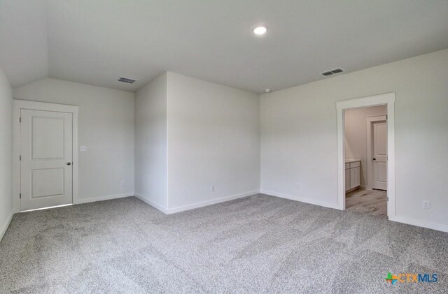 3625 Meteor Rd, New Braunfels, TX 78130 - carpeted empty room with baseboards and lofted ceiling