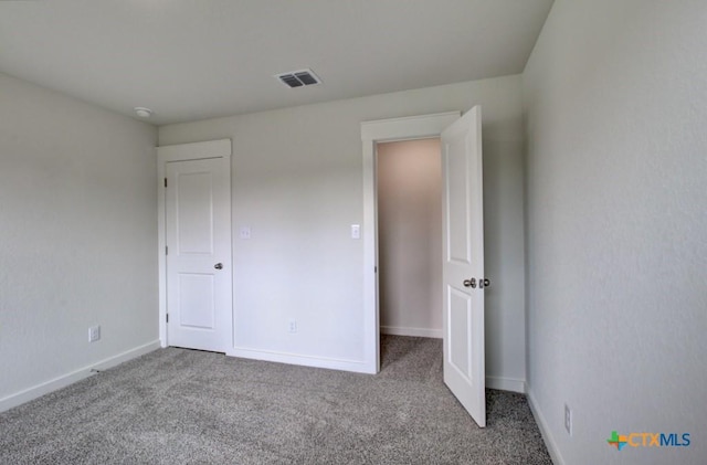 3625 Meteor Rd, New Braunfels, TX 78130 - unfurnished bedroom with carpet floors and baseboards