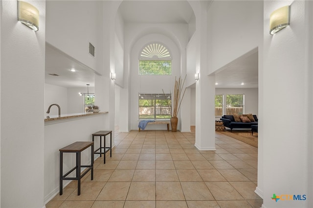 16503 Lounsbury Pl, Austin, TX 78717 - entryway featuring a towering ceiling and light tile patterned floors