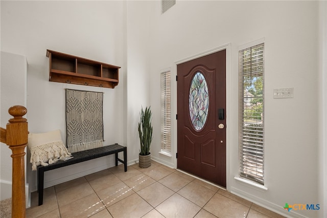 16503 Lounsbury Pl, Austin, TX 78717 - entrance foyer featuring light tile patterned floors and a towering ceiling