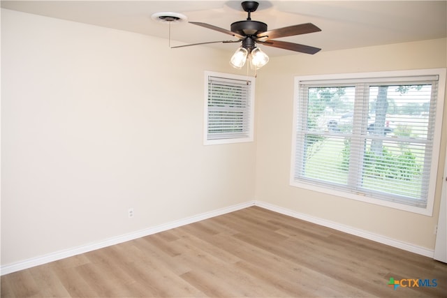 706 Edinburgh St, Victoria, TX 77904 - unfurnished room with light wood finished floors and ceiling fan
