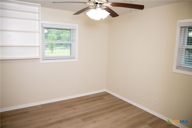 706 Edinburgh St, Victoria, TX 77904 - unfurnished room featuring wood finished floors and a ceiling fan