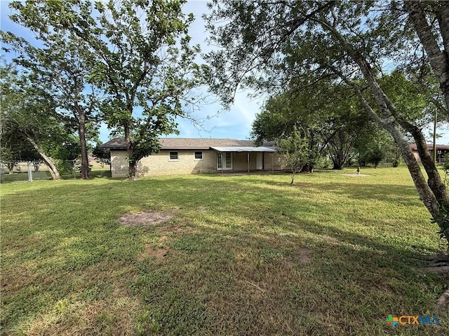 706 Edinburgh St, Victoria, TX 77904 - view of grassy yard