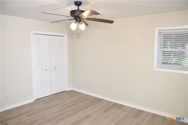 706 Edinburgh St, Victoria, TX 77904 - unfurnished bedroom featuring light wood-type flooring, a closet, and ceiling fan