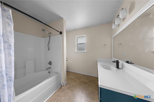 3810 John Haedge Dr, Killeen, TX 76549 - full bathroom with shower / tub combo with curtain, vanity, and a textured ceiling