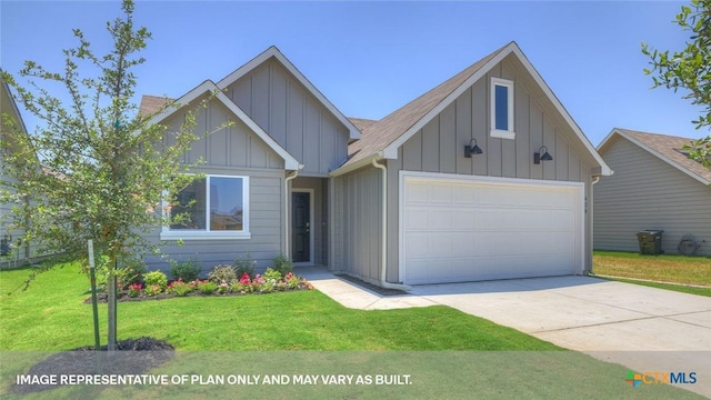 view of front facade with a front lawn and a garage