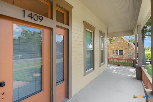 balcony featuring covered porch