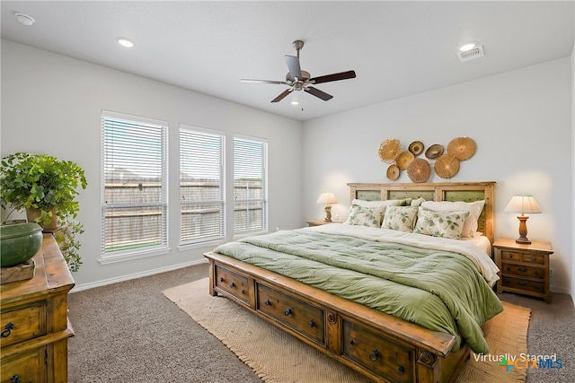 bedroom featuring ceiling fan and light colored carpet