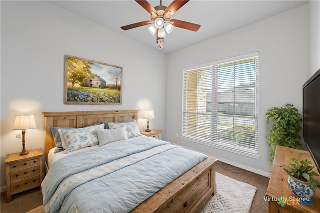 bedroom featuring ceiling fan and carpet flooring